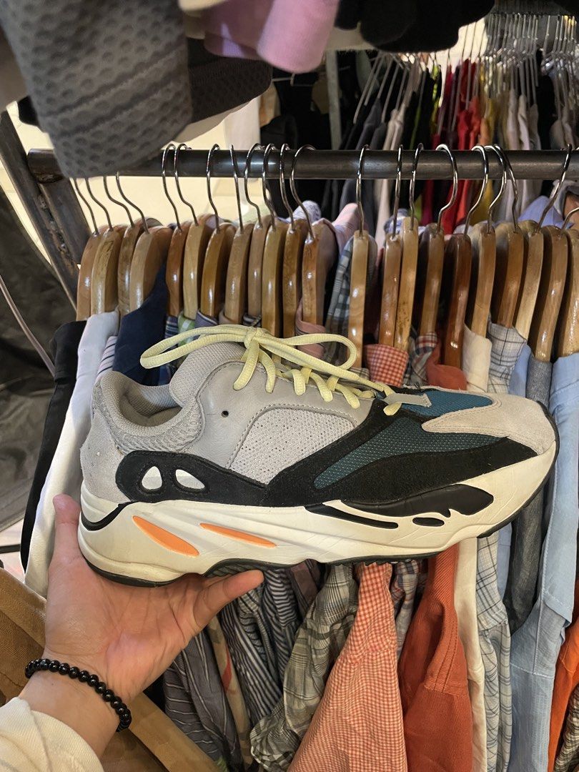 Adidas Yeezy Boost 700 'Wave Runner' Sneakers (Category: Sneakers) located in Quezon City. Submitted by madisonred (Listing ID 1463850205, Image 3). Description: Authentic Adidas Yeezy Boost 700 Wave Runner, bought in the U.S. 🇺🇸 SIZE - US 9 1/2 | UK 9 | 43 1/2 - Adidas Yeezy Boost 700 Wave Runner - Striking grey, teal, and orange colorway - Light yellow laces - Ideal for casual and everyday wear.