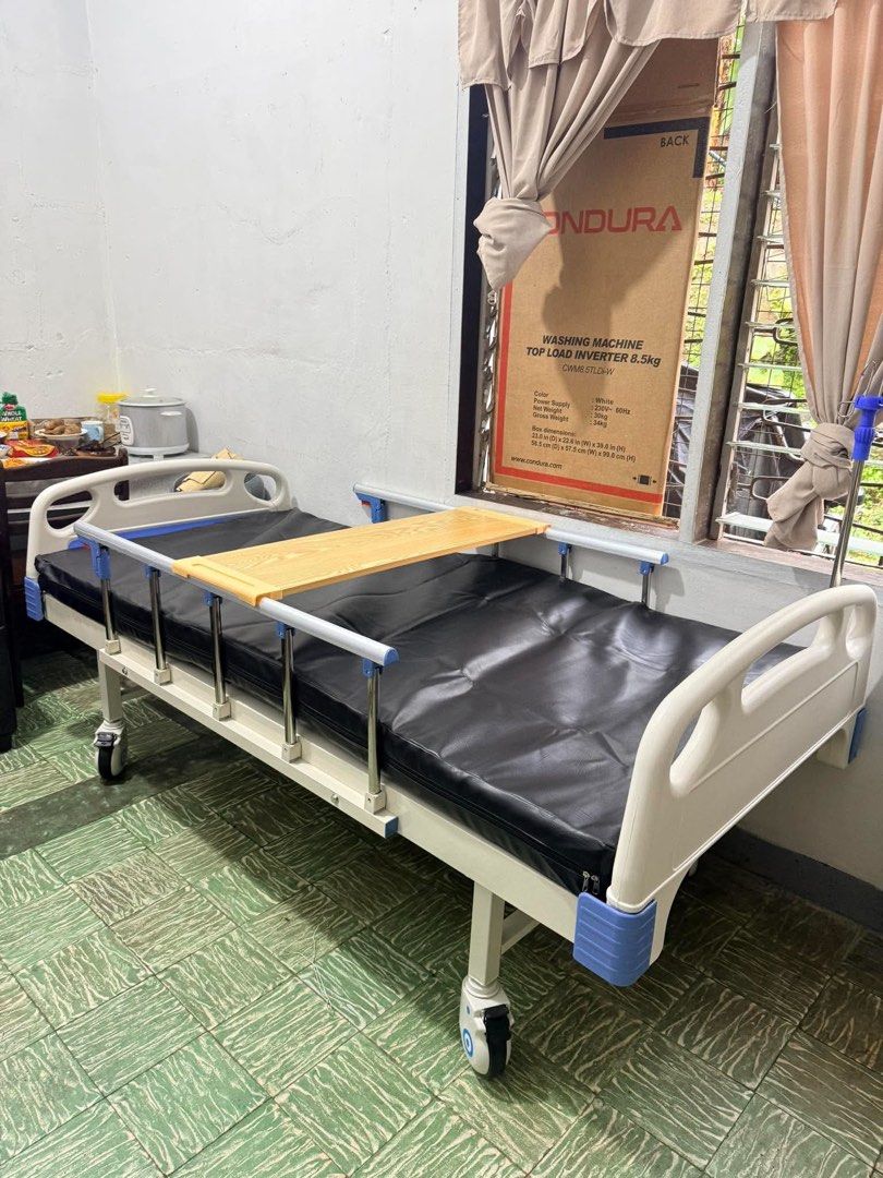 Adjustable Hospital Bed with Mattress and Tray (Category: Bed Frames & Mattresses) located in Manila. Submitted by rosel2001 (Listing ID 1463768013, Image 1). Description: - Adjustable hospital bed - Includes comfortable mattress - Comes with a side tray - Equipped with wheels for easy mobility - Ideal for home care needs - Ready for pickup.