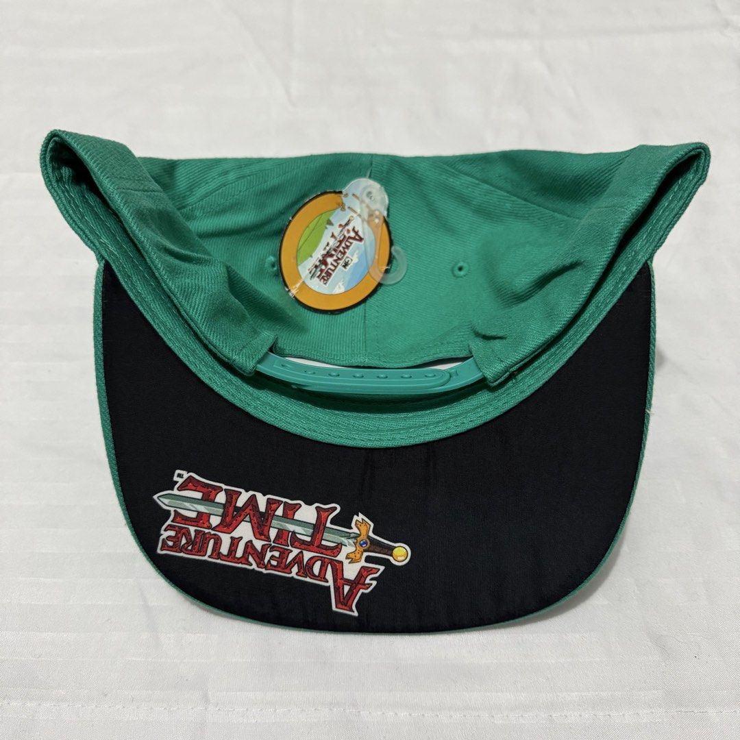 ADVENTURE TIME (Category: Caps & Hats) located in Pasig City. Submitted by jaaard (Listing ID 1463922314, Image 2). Description: Brand new adventure time cap Minimal scratch issue center bottom area.