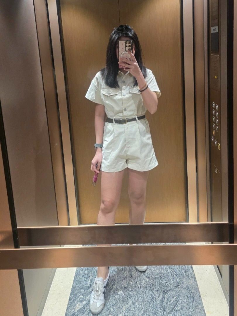 AEOM Beige Shorts Romper (Category: Rompers) located in Manila. Submitted by dcory (Listing ID 1463853047, Image 1). Description: - with side pockets - comes with beige belt (as seen in the mannequin) Measurements Bust: 34 inches Waist: 24-26 inches Length: 28 inches.
