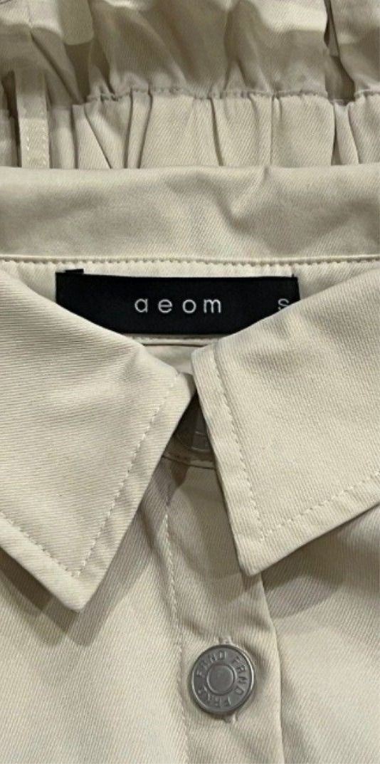 AEOM Beige Shorts Romper (Category: Rompers) located in Manila. Submitted by dcory (Listing ID 1463853047, Image 3). Description: - with side pockets - comes with beige belt (as seen in the mannequin) Measurements Bust: 34 inches Waist: 24-26 inches Length: 28 inches.