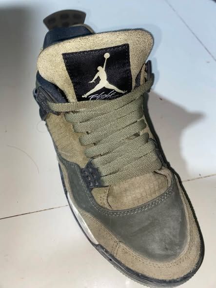 Air Jordan 4 Retro Olive Green (Category: Sneakers) located in Caloocan City. Submitted by warymclovin (Listing ID 1463874513, Image 1). Description: - selling to make a living - Authentic Air Jordan 4 Retro - Unique olive green colorway - Classic and iconic silhouette - Perfect for casual wear or collectors - Shows some signs of wear, but plenty of life left - Grab these must-have kicks!.