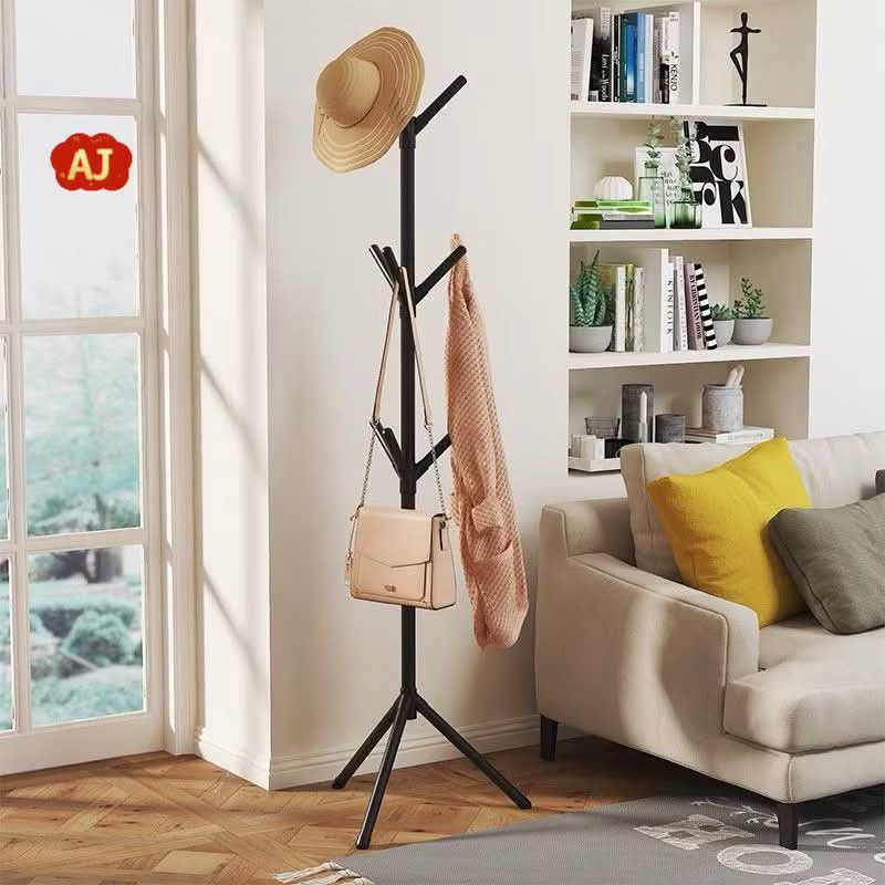 AJ Coat Rack - Black or White - Tripod Stand (Category: Hooks & Hangers) located in Manila. Submitted by iliasjen3082126 (Listing ID 1463929795, Image 1). Description: - Stylish tripod coat rack - Available in black or white - Easy to assemble with integrated handrail - Strong and durable steel pipe construction - Moisture-proof and mildew-resistant - Perfect for organizing coats, bags, and hats.