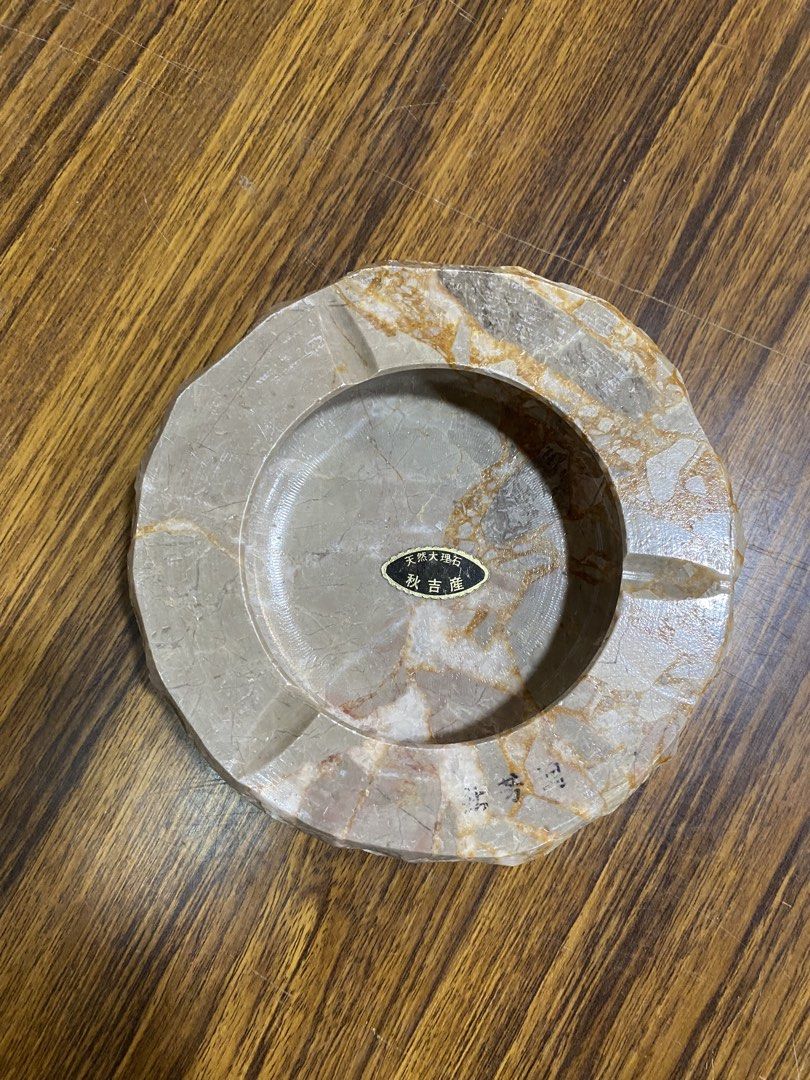 Akiyoshi Natural Stone Marble Style Ashtray (Category: Other Home Decor) located in Calamba. Submitted by chebvintagedepot (Listing ID 1463812668, Image 2). Description: [B11-01] This Akiyoshi Marble Ashtray is made from natural stone with a beige and brown pattern. The carved stone gives it a simple, natural look and makes it suitable for use as an ashtray, small catchall, or decorative piece. Dimensions: Approx. 6 inches Diameter Note: Please r