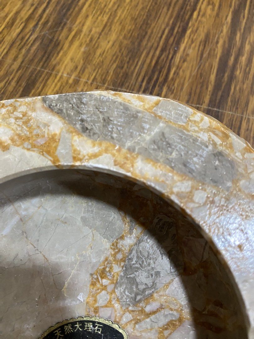 Akiyoshi Natural Stone Marble Style Ashtray (Category: Other Home Decor) located in Calamba. Submitted by chebvintagedepot (Listing ID 1463812668, Image 3). Description: [B11-01] This Akiyoshi Marble Ashtray is made from natural stone with a beige and brown pattern. The carved stone gives it a simple, natural look and makes it suitable for use as an ashtray, small catchall, or decorative piece. Dimensions: Approx. 6 inches Diameter Note: Please r