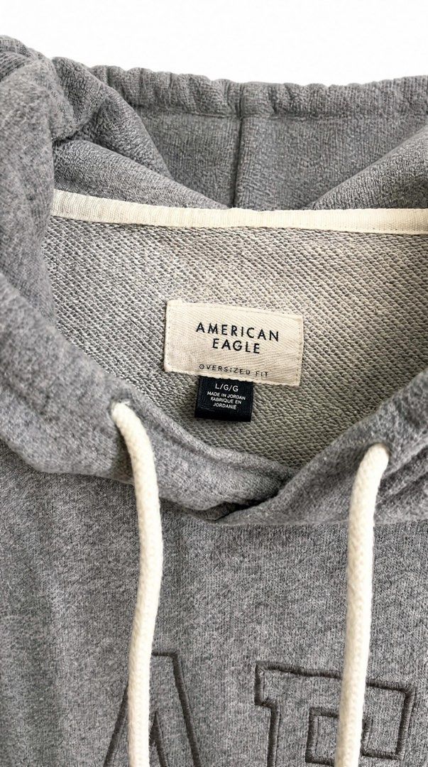 American Eagle Grey AE Embroidered Hoodie (Category: Hoodies) located in Mandaluyong City. Submitted by unomarcelo001 (Listing ID 1463803558, Image 2). Description: L-29 W-27 LARGE on tag but can fit up to XL no flwas good as new - Grey hoodie from American Eagle - Features embroidered AE logo on the front - AE logo also present on the sleeve - Includes a front pocket - Adjustable drawstrings for the hood - Comfortable and casual style price stil