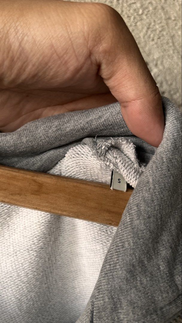 AMI Paris Grey Half Zip Sweatshirt (Category: Coats, Jackets and Outerwear) located in Cabuyao City. Submitted by bulandos (Listing ID 1463838703, Image 3). Description: - Grey AMI Paris sweatshirt - Size: S but large fittings - Signature Ami de Coeur logo embroidered on chest - Half zip closure with stand-up collar - Kangaroo pocket - Material: 100% organic cotton.
