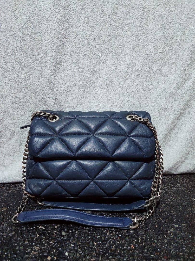 AN-NATASHA Quilted Leather Chain Shoulder Bag (Category: Shoulder Bags) located in Baguio. Submitted by jayrgijc52758 (Listing ID 1463746943, Image 1). Description: An-Natasha leather 2 way bag Small size Kasya long wallet Mahal din itong brand In very good condition 850.