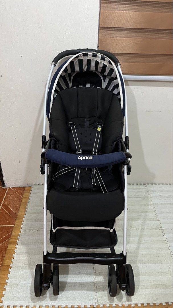 Aprica Stroller - Navy Blue (Category: Strollers) located in Santa Rosa. Submitted by mommy.cole.affordable.stuff (Listing ID 1463802410, Image 1). Description: Aprica Luxuna Air Stroller -usage period : newborn to 36 months (15kg) -Stroller Weight: 4kg-5kg (lightweight) -Folding mechanism: one hand folding -Seat recline position: 124-158 degree adjustable (Seat-fully recline) -Two way facing (reversible handle) -Basket storage capacity: 27 litre