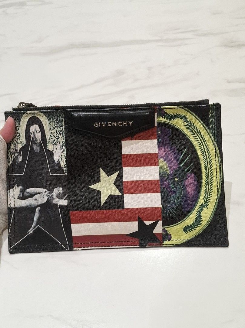 Archive Givenchy Glitched Madonna Clutch Bag (Authentic) (Category: Belt bags, Clutches and Pouches) located in Pasig City. Submitted by coveted.mnl (Listing ID 1463846530, Image 1). Description: Authentic. Archive Discontinued Glitched Madonna Condition - 9/10 Color Rate - 10/10 Retail went for $400 (P24,800) Message us for more info🤍 (measurements, specific detail, etc.) Open for offers ;).
