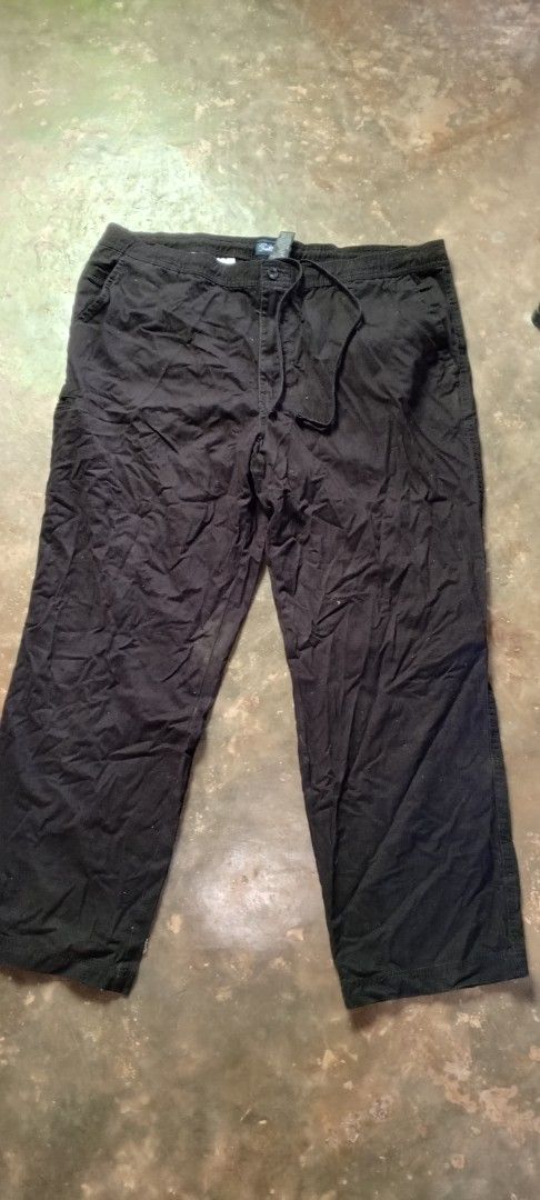 Arnold Palmer Black Casual Pants Size 42x30 (Category: Trousers) located in Manila. Submitted by ezekislacl02490 (Listing ID 1463770521, Image 1). Description: - Brand: Arnold Palmer - Color: Black - Size: 42x30 - Features: Drawstring waist, Button closure - Material: 100% Cotton - Style: Casual, Relaxed fit - Ideal for: Everyday wear.
