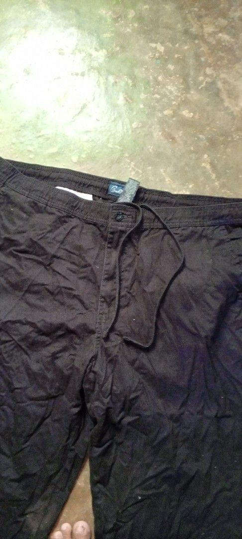 Arnold Palmer Black Casual Pants Size 42x30 (Category: Trousers) located in Manila. Submitted by ezekislacl02490 (Listing ID 1463770521, Image 2). Description: - Brand: Arnold Palmer - Color: Black - Size: 42x30 - Features: Drawstring waist, Button closure - Material: 100% Cotton - Style: Casual, Relaxed fit - Ideal for: Everyday wear.