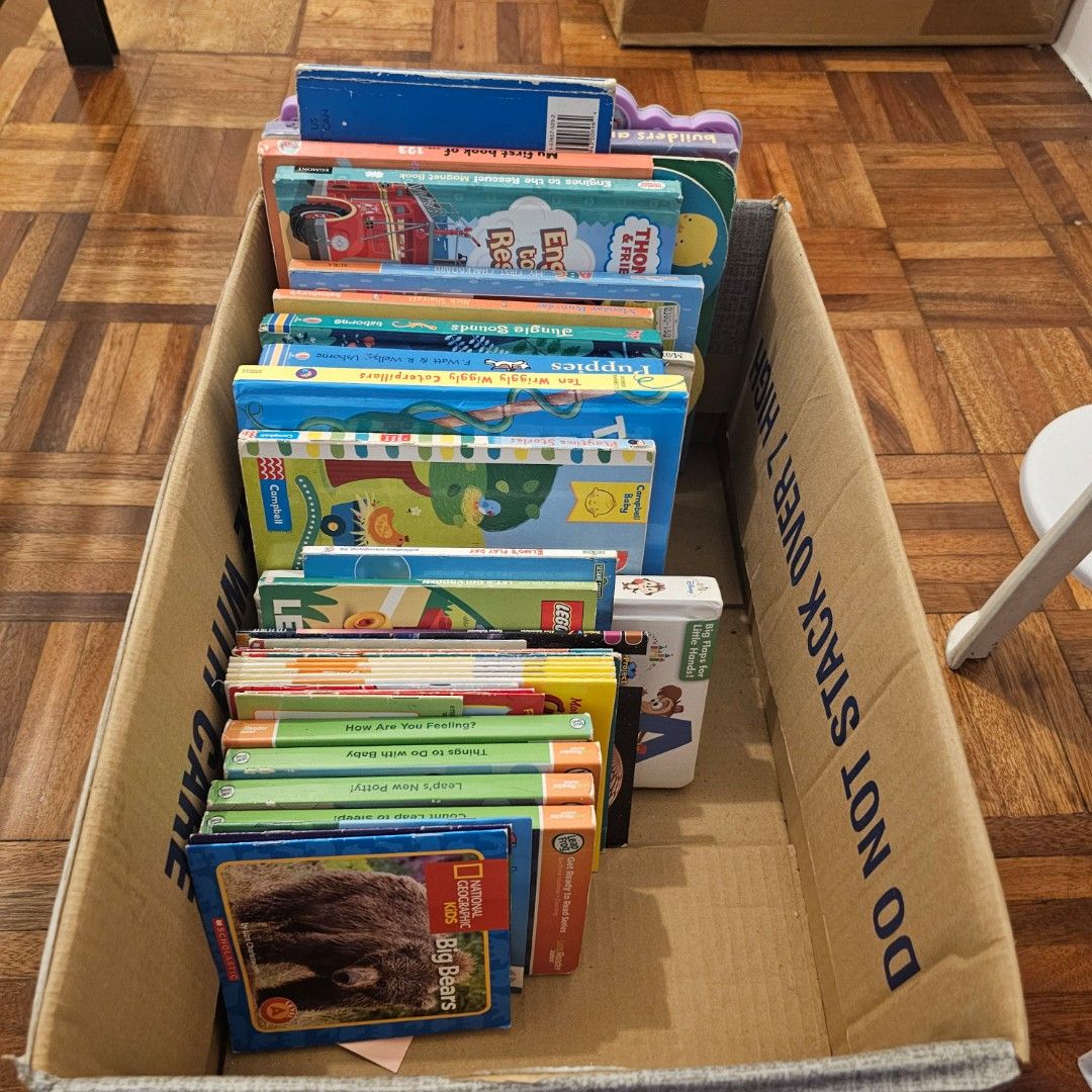 Assorted Children's Books and Wooden Puzzles Bundle (Category: Children's Books) located in Marikina City. Submitted by asbalbido (Listing ID 1463757931, Image 1). Description: - Collection of children's books included - Features books like Curious George and National Geographic Kids - Some books focus on numbers and letters - Bundle includes wooden puzzles - Puzzles have bright colors and simple designs - Ideal for toddlers and young children - 