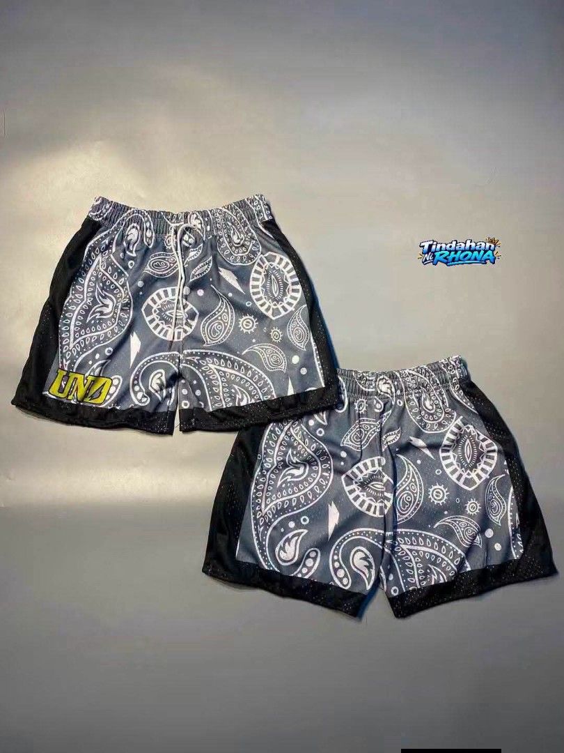 Assorted Mesh Shorts - Various Designs (Category: Shorts) located in Tarlac. Submitted by rawna08 (Listing ID 1463789691, Image 3). Description: Selling premium high quality mesh shorts. Designs include camouflage panels, all-over DBTK print, paisley bandana, cartoon/food print, and pink with dice. Elastic waistbands with drawstrings. Great for casual wear or sports. Details: - freesize - 16 inches length - up 26 to 42 waistline - 12-13 inches le
