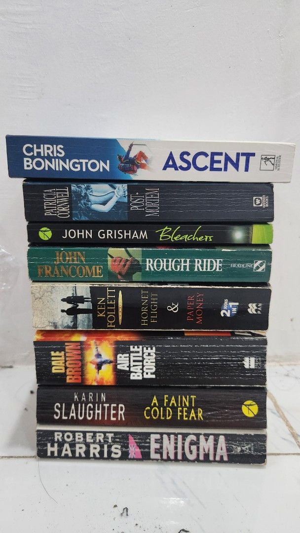 Assorted Paperback Thriller and Adventure Books (Category: Storybooks) located in Manila. Submitted by bookchetera (Listing ID 1463820899, Image 1). Description: -100 each; 500 if take all - Collection of paperback books for sale. - Titles include: - Ascent by Chris Bonington - Postmortem by Patricia Cornwell - Bleachers by John Grisham - Rough Ride by John Francome - Paper Money & Hornet Flight by Ken Follett - Air Battle Force by Dale Brown - A
