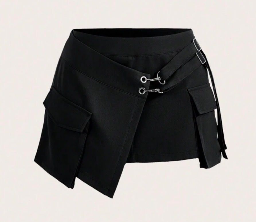 Asymmetric Patchwork 3D Pocket Low Waist Mini Skirt (Category: Skirts) located in Tarlac. Submitted by ainsleyjudd (Listing ID 1463846626, Image 2). Description: - Asymmetric Low Waist Mini Skirt - Can fit 24-25 waistline - Can be worn for cosplay or edgy look - Trendy Y2K / Streetwear aesthetic.