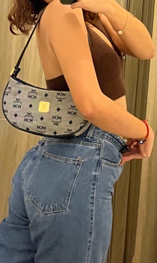 Auth MCM Monogram Shoulder Bag (Category: Luxury Bags & Wallets) located in Cavite. Submitted by declutterringggggg (Listing ID 1463836172, Image 1). Description: - Classic MCM shoulder bag - All-over monogram print - Gold-tone metal logo plate - Dark leather strap - Zipper closure - Shows some signs of wear on exterior fabric and leather trim - Great everyday bag.