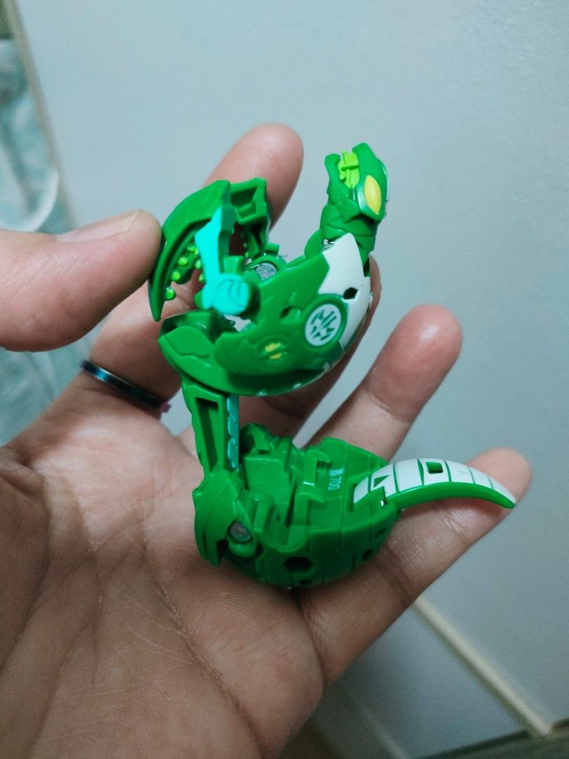 Authentic Bakugan take all 7pcs for 850 (Category: Action & Battle Toys) located in Caloocan City. Submitted by jark_moonshop (Listing ID 1463874753, Image 3). Description: - Collection of Bakugan toys available. - Features multiple characters in both ball and monster forms. - Includes unique colors like gold, purple, and blue. - All toys are transformable. - Some items show minor signs of play. - Ideal for collectors and children's playtime..