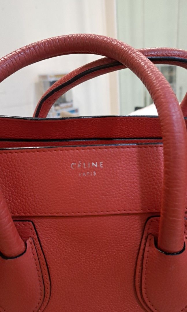 Authentic Celine luggage micro shopper handbag (Category: Luxury Bags & Wallets) located in Manila. Submitted by eiusthia16 (Listing ID 1463775053, Image 2). Description: Authentic Pre-Loved Celine luggage micro shopper Handbag tote bag leather Orange red ₱29k Pm me for more details. Meet up for sure buyer All Good condition...
