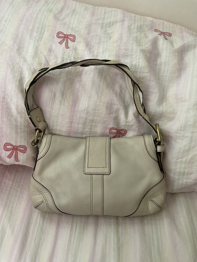 Authentic Coach Ivory Full Leather Mini Soho w/ Braided Strap (Category: Luxury Bags & Wallets) located in Manila. Submitted by sirifufufu (Listing ID 1463920021, Image 2). Description: Authentic Coach Ivory Full Leather Mini Soho w/ Braided Strap 🤍🦢 🌷 AVAILABLE 🌷 ⁀જ➣ 16k | $265 + sf ────୨ৎ──── ♡ Pristine condition ♡ No canvas rubs or leather cracks ♡ Clean interior and exterior ♡ No foul smell! Storage is pet-free and smoke-free ♡ Guaranteed