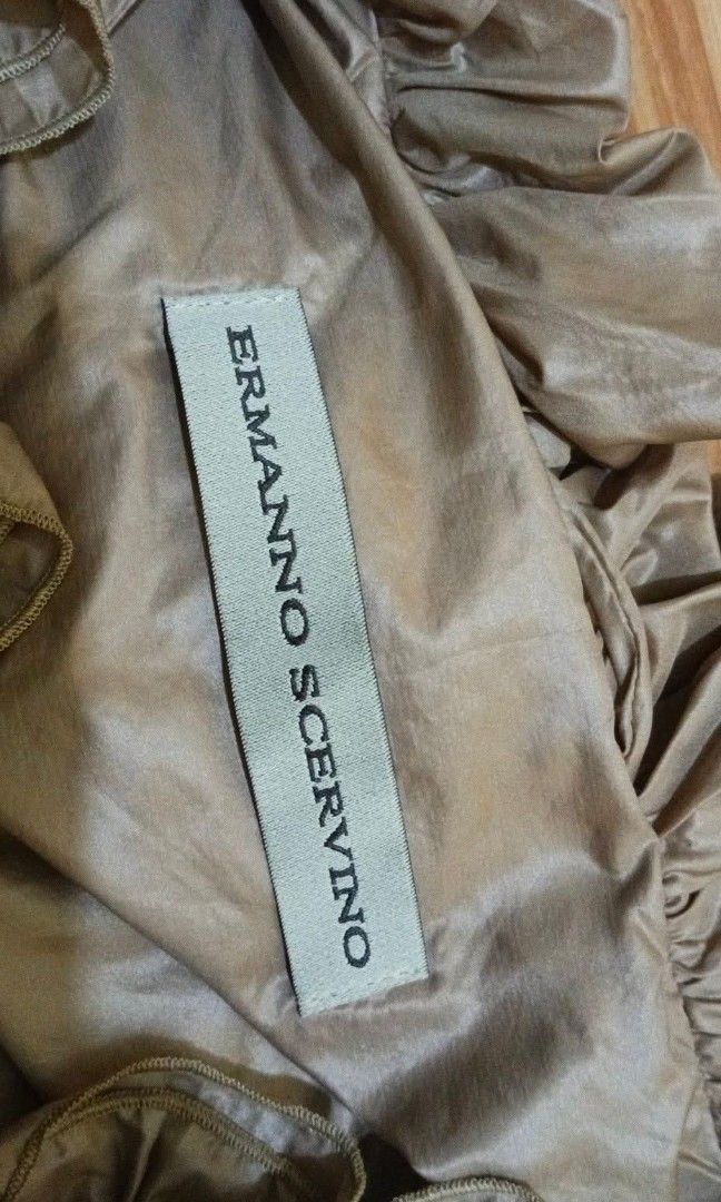 Authentic Ermanno Scervino Italy Real Down Vest (Small) (Category: Coats, Jackets and Outerwear) located in Calamba. Submitted by gs_gsk_akkv.26 (Listing ID 1463924218, Image 3). Description: 100% Authentic Ermanno Scervino Italy Luxury Ruffle Down Vest. High-end Italian designer piece (Couture quality). Perfect for winter travel or cold weather. • Brand: Ermanno Scervino (Made in Italy) • Material: 90% Real Duck Down + 10% Feather (Super warm an
