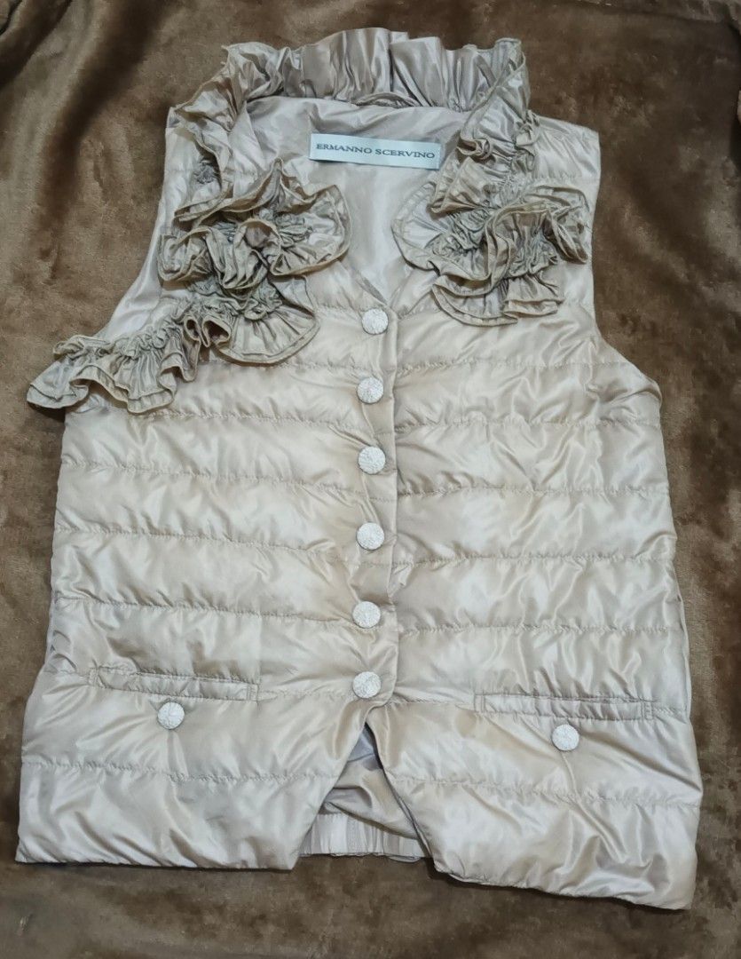 Authentic Ermanno Scervino Italy Real Down Vest (Small) (Category: Coats, Jackets and Outerwear) located in Calamba. Submitted by gs_gsk_akkv.26 (Listing ID 1463924218, Image 1). Description: 100% Authentic Ermanno Scervino Italy Luxury Ruffle Down Vest. High-end Italian designer piece (Couture quality). Perfect for winter travel or cold weather. • Brand: Ermanno Scervino (Made in Italy) • Material: 90% Real Duck Down + 10% Feather (Super warm an
