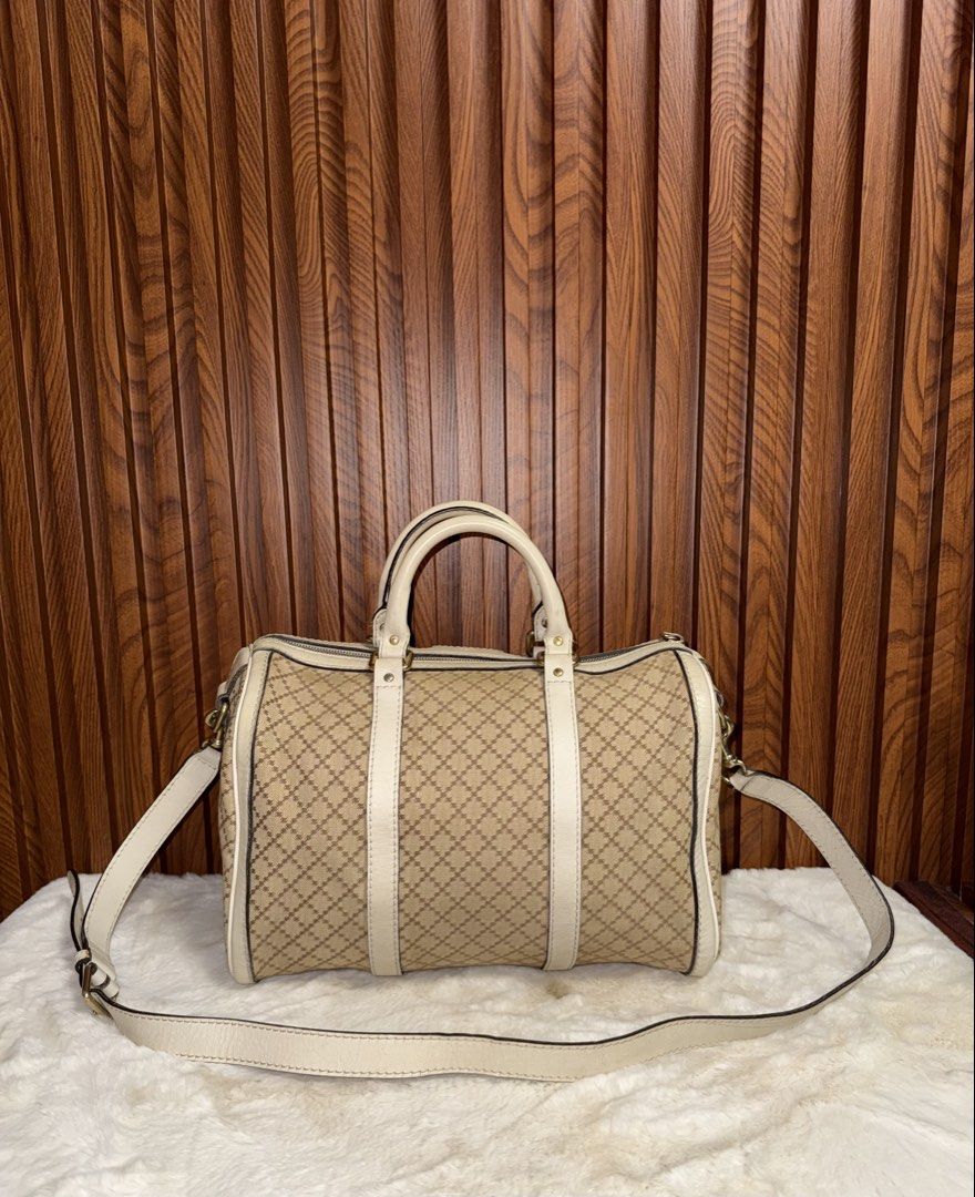 Authentic Gucci Diamante Boston Bag (Category: Luxury Bags & Wallets) located in Subic. Submitted by luxshoppe88 (Listing ID 1463826463, Image 3). Description: - Classic Gucci Boston bag - Beige canvas with signature diamante pattern - Cream leather trim and handles - Detachable shoulder strap included - Ideal for everyday use mode of payment : bpi and gcash shipping will be done once payment confirm.. or the next day. HAPPY SHOPPING!! T-H-A-N-K 