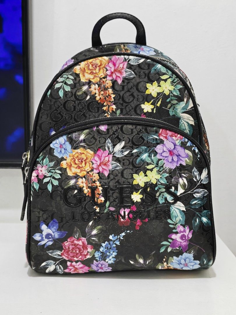 Authentic GUESS Floral BackPack (Category: Backpacks) located in Pasig City. Submitted by dian.juliet (Listing ID 1463859647, Image 1). Description: ▪️Bought P7k plus ▪️Negotiable ▪️Minimal flaw inside the bag ONLY. Pls see pictures. ▪️Used once during travel. ▪️From USA ▪️What you see is what you get. ▪️Colors may vary due to lightning. ▪️Flaws are barely noticeable. ▪️Feel free to message me for other details. :) 🖤 dian.