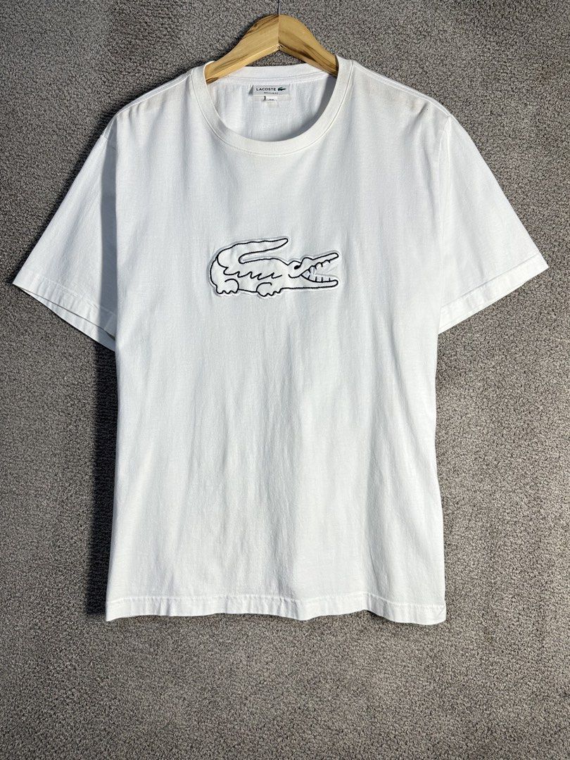 ✨AUTHENTIC Lacoste Regular Fit White (Category: Tshirts & Polo Shirts ) located in General Santos City (Dadiangas). Submitted by skrilex (Listing ID 1463830180, Image 1). Description: - White Lacoste T-Shirt - Size: XL - Fit: Regular - Features: Embroidered classic crocodile logo on chest - Measurements: 23.5 inches wide x 28 inches long - Style: Great staple piece for any wardrobe.