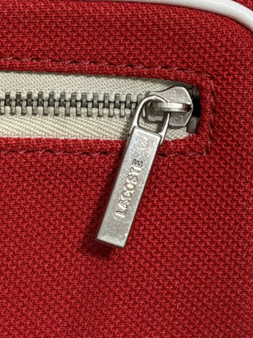 Authentic Lacoste Yachting (Category: Cross-body Bags) located in Quezon City. Submitted by chic.bags (Listing ID 1463891757, Image 2). Description: With etiketa Canvas and leather material Adjustable strap Looks new No issue Actual photo posted Mop: gcash .