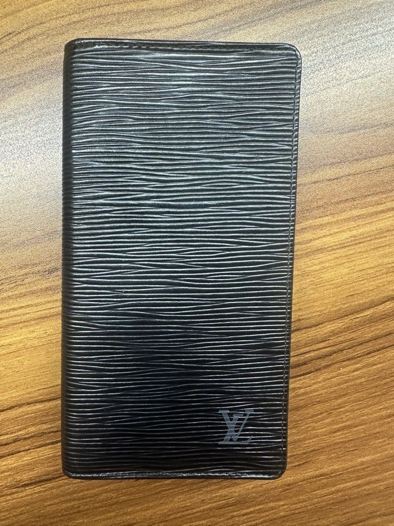 Authentic lv epi long wallet (Category: Luxury Bags & Wallets) located in Manila. Submitted by chacloset26 (Listing ID 1463779428, Image 2). Description: No flaws still in good condition.