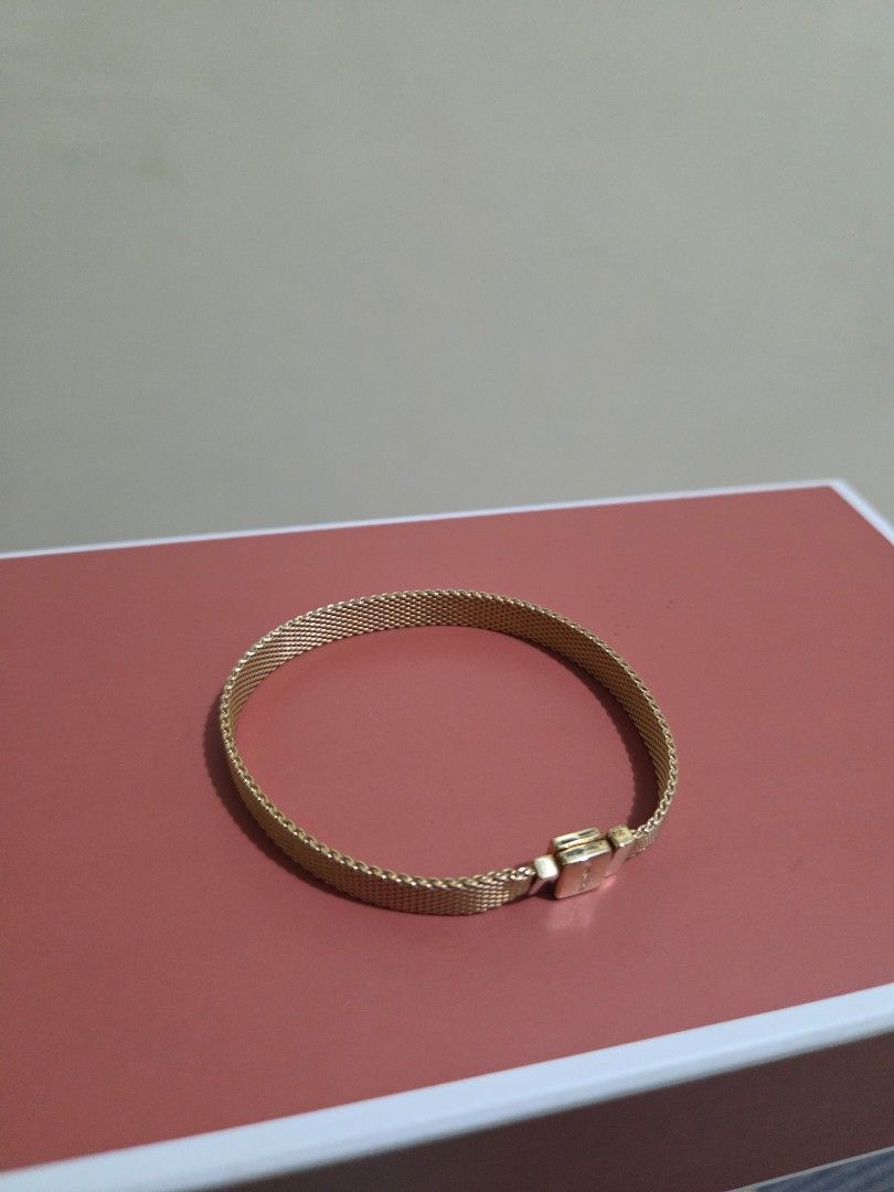 Authentic Pandora reflexion bracelet (Category: Bracelets) located in Naguilian. Submitted by impulsive.buyer02 (Listing ID 1463846628, Image 1). Description: 17 cm 14k gold plated Bought 11650php @ z*lora.