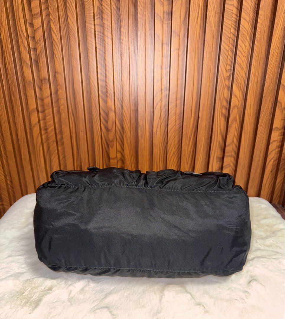 Authentic Prada Nylon Messenger Bag Black (Category: Luxury Bags & Wallets) located in Subic. Submitted by luxshoppe88 (Listing ID 1463827119, Image 3). Description: - Classic black Prada messenger bag - Made in Italy - Durable nylon material - Spacious interior - Adjustable strap for comfort - Secure buckle closures on front flap - Ideal for everyday use mode of payment : bpi and gcash shipping will be done once payment confirm.. or the next day