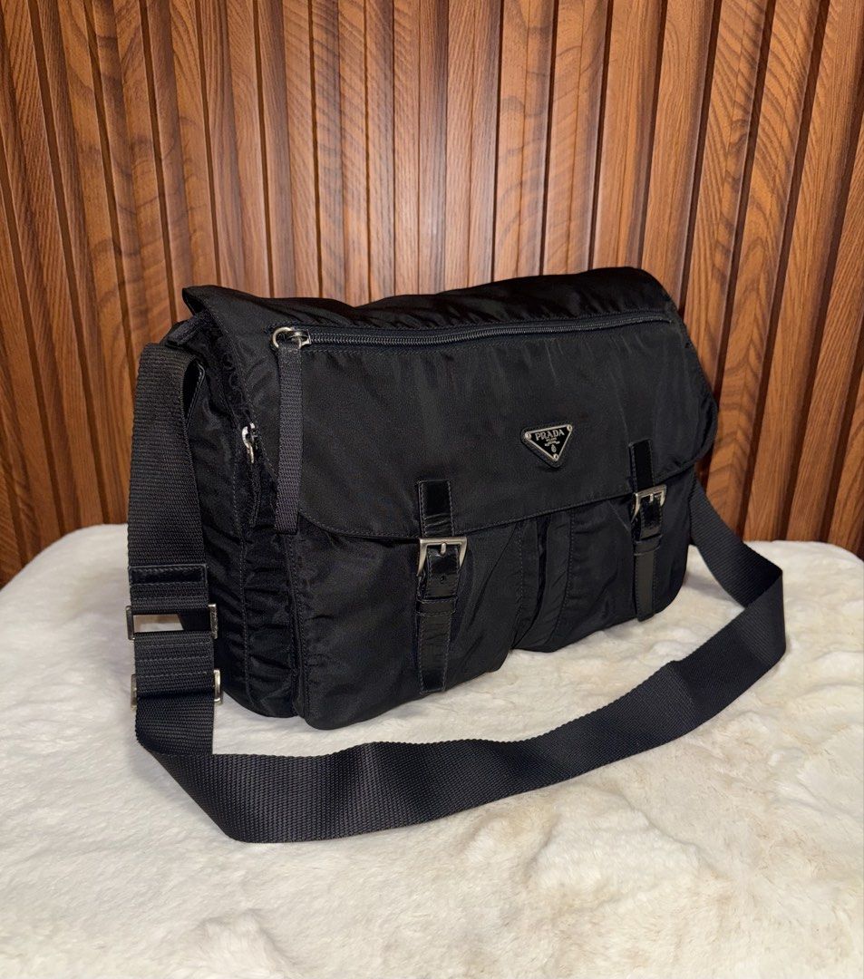 Authentic Prada Nylon Messenger Bag Black (Category: Luxury Bags & Wallets) located in Subic. Submitted by luxshoppe88 (Listing ID 1463827119, Image 1). Description: - Classic black Prada messenger bag - Made in Italy - Durable nylon material - Spacious interior - Adjustable strap for comfort - Secure buckle closures on front flap - Ideal for everyday use mode of payment : bpi and gcash shipping will be done once payment confirm.. or the next day