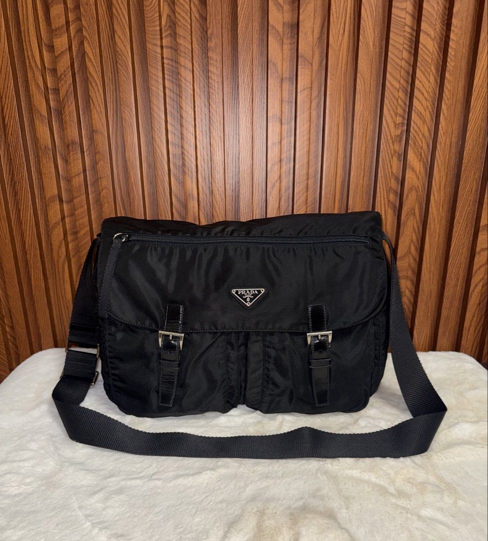 Authentic Prada Nylon Messenger Bag Black (Category: Luxury Bags & Wallets) located in Subic. Submitted by luxshoppe88 (Listing ID 1463827119, Image 2). Description: - Classic black Prada messenger bag - Made in Italy - Durable nylon material - Spacious interior - Adjustable strap for comfort - Secure buckle closures on front flap - Ideal for everyday use mode of payment : bpi and gcash shipping will be done once payment confirm.. or the next day