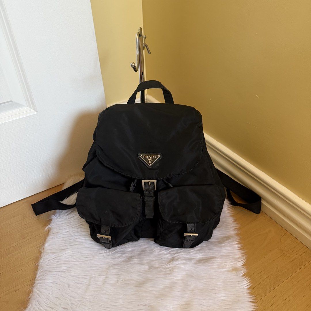 Authentic Preloved Prada Black Nylon Backpack Medium (Category: Luxury Bags & Wallets) located in Quezon City. Submitted by tokyoluxestuff2013 (Listing ID 1463834905, Image 1). Description: Authentic Preloved Prada Black Nylon Medium Backpack Approx 34cm W x 36cm H No inclusion Excellent condition Shipping via LBC/ Grab/ Lalamove Add shipping fee.