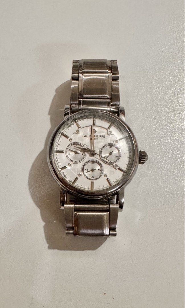 AUTOMATIC High Quality Silver Patek Replica Watch (Category: Luxury Watches) located in Makati City. Submitted by forg3d_paradox (Listing ID 1463935824, Image 1). Description: 🌟Preloved and working. 🌟No Box 🌟Minimal signs of use can be seen but barely notice when worn. 🌟 good for formal, casual, and everyday use. 🌟 classic and sophisticated vibe 🌟Still pretty in actual. 🌟 reasonably negotiable.