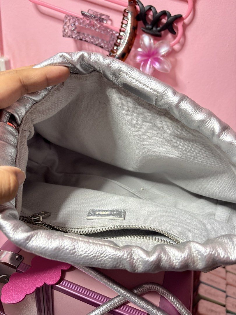 Aztrid Small Dumpling Bag in Silver (Category: Cross-body Bags) located in Manila. Submitted by gian_0 (Listing ID 1463918564, Image 3). Description: used once during the stardust concert, never na nagamit since laging nasa school :(.