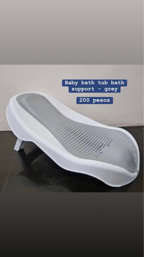Baby Bath Tub Bath Support - Grey (Category: Bathtub & Bath Accessories) located in Santa Rosa. Submitted by malyaolivera (Listing ID 1463794102, Image 1). Description: - Securely supports your baby during bath time. - Stylish grey and white design. - Perforated surface allows for easy drainage. - Simple to clean and maintain. - Ideal for newborns and infants..