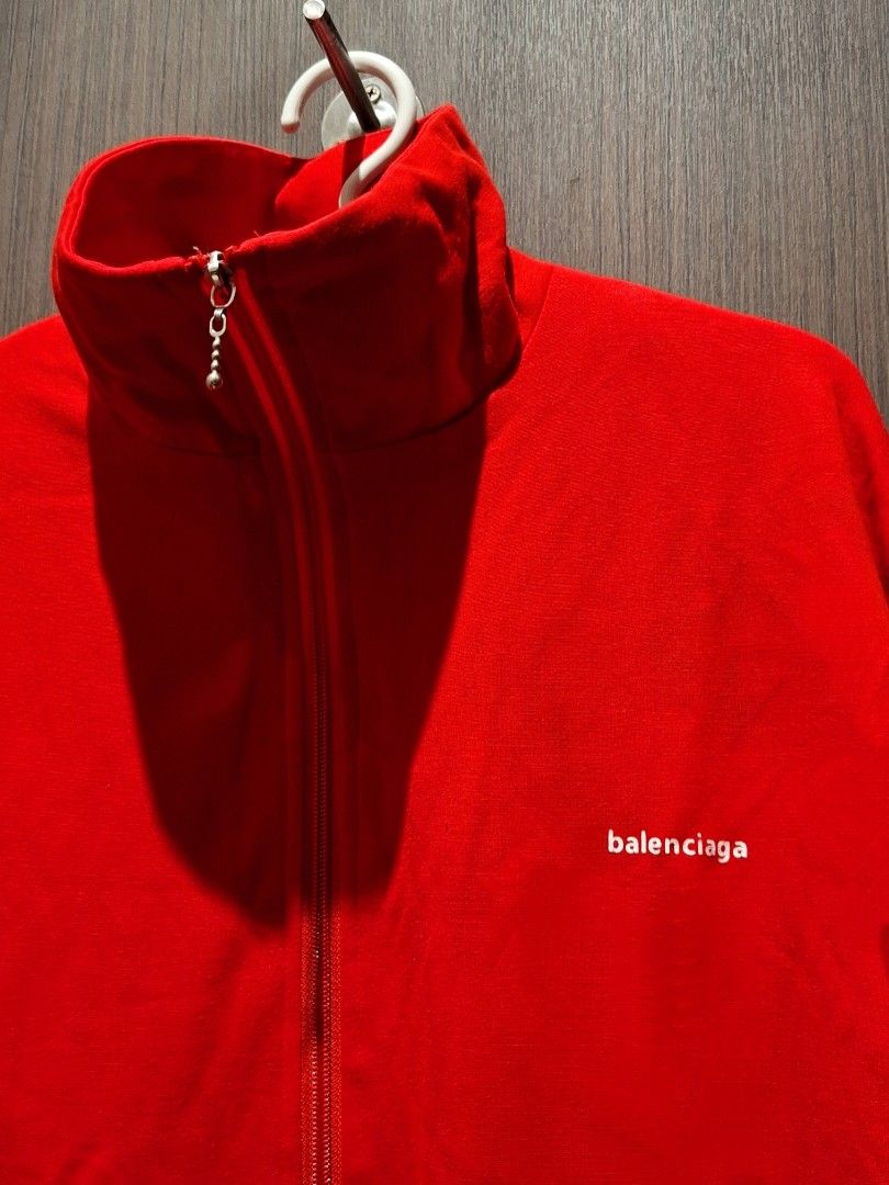 Balenciaga Archetype Red Track Jacket (Auth) (Category: Coats, Jackets and Outerwear) located in Pasig City. Submitted by coveted.mnl (Listing ID 1463895278, Image 1). Description: Authentic. Discontinued Colorway📌 Double Zip~ Best fit to: Large - XL Width : 25 Length : 25 (MEASURED BY INCHES) 9.5/10 overall condition No issues or flaws in fabric • P2,200 Slightly negotiable • Pasig City meet up • Open for COD Via Lalamove or Grab • J&T courier 