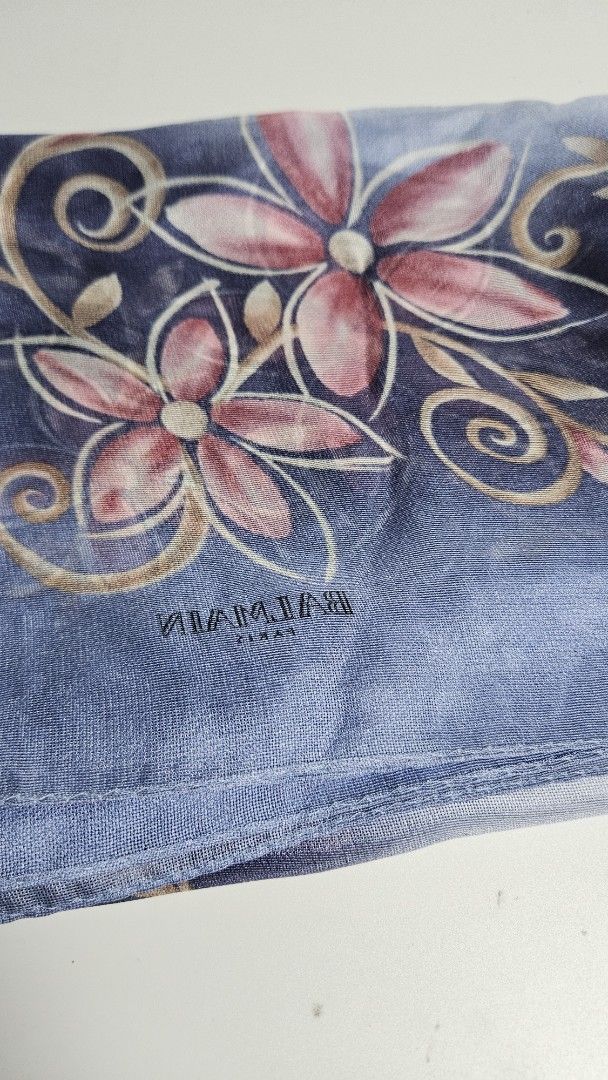 Balmain silk scarf (Category: Women's Watches) located in Alfonso. Submitted by jbcamet (Listing ID 1463823841, Image 2). Description: - Brand: Balmain - Material: Silk - Design: Blue and pink floral pattern with swirling accents - Adds elegance to any outfit.