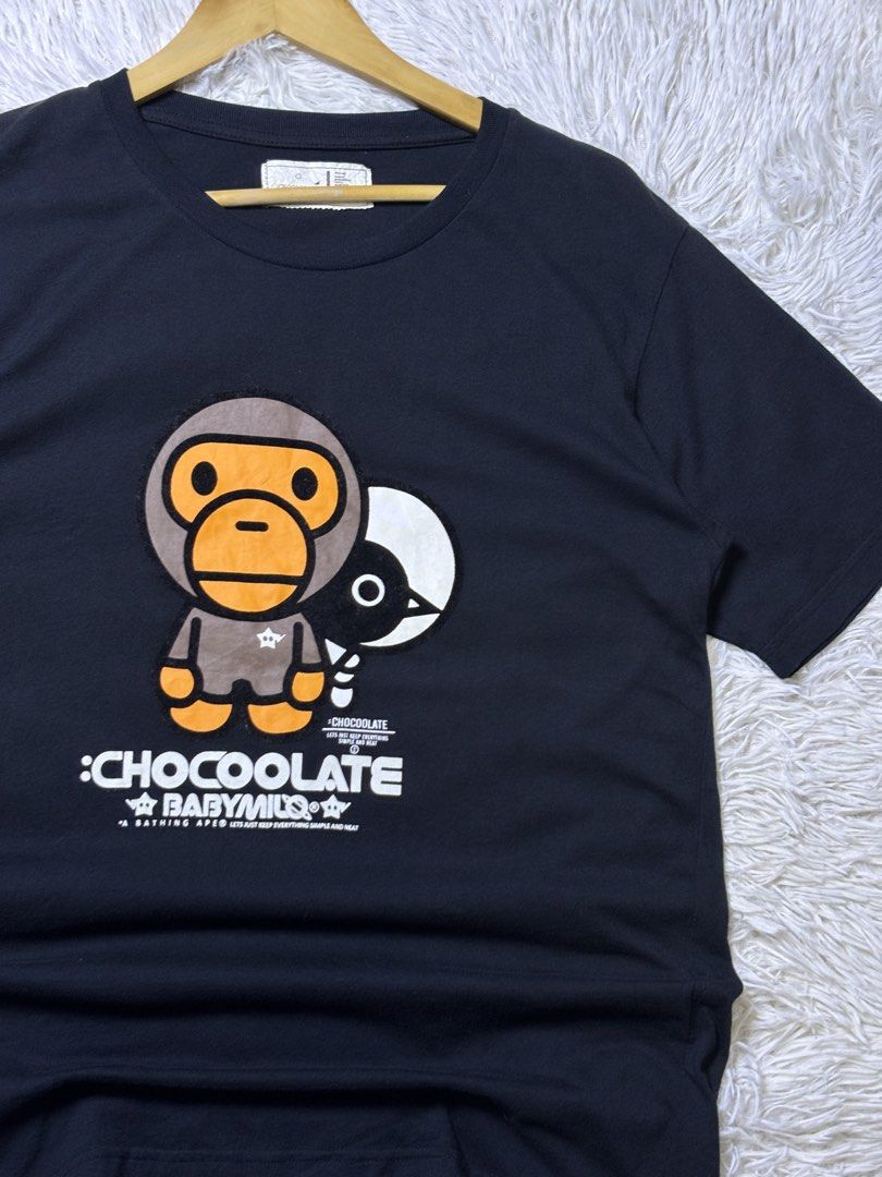 BAPE BABYMILO x CHOCOLATE TEE (Category: Shirts) located in Catbalogan. Submitted by christopszxc31 (Listing ID 1463841785, Image 2). Description: - BAPE BABYMILO x CHOCOLATE Black T-Shirt - Tagged Size: L - Features iconic BABYMILO character and bird graphic print - Ideal for streetwear enthusiasts and A Bathing Ape fans.