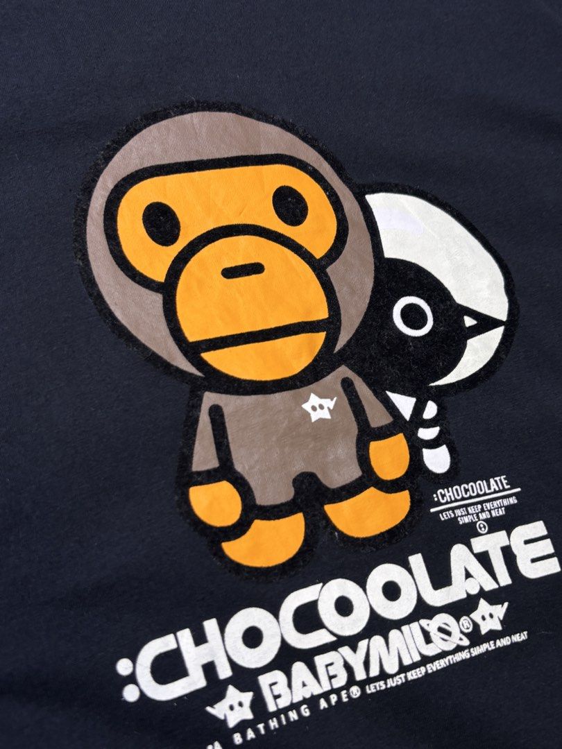 BAPE BABYMILO x CHOCOLATE TEE (Category: Shirts) located in Catbalogan. Submitted by christopszxc31 (Listing ID 1463841785, Image 3). Description: - BAPE BABYMILO x CHOCOLATE Black T-Shirt - Tagged Size: L - Features iconic BABYMILO character and bird graphic print - Ideal for streetwear enthusiasts and A Bathing Ape fans.