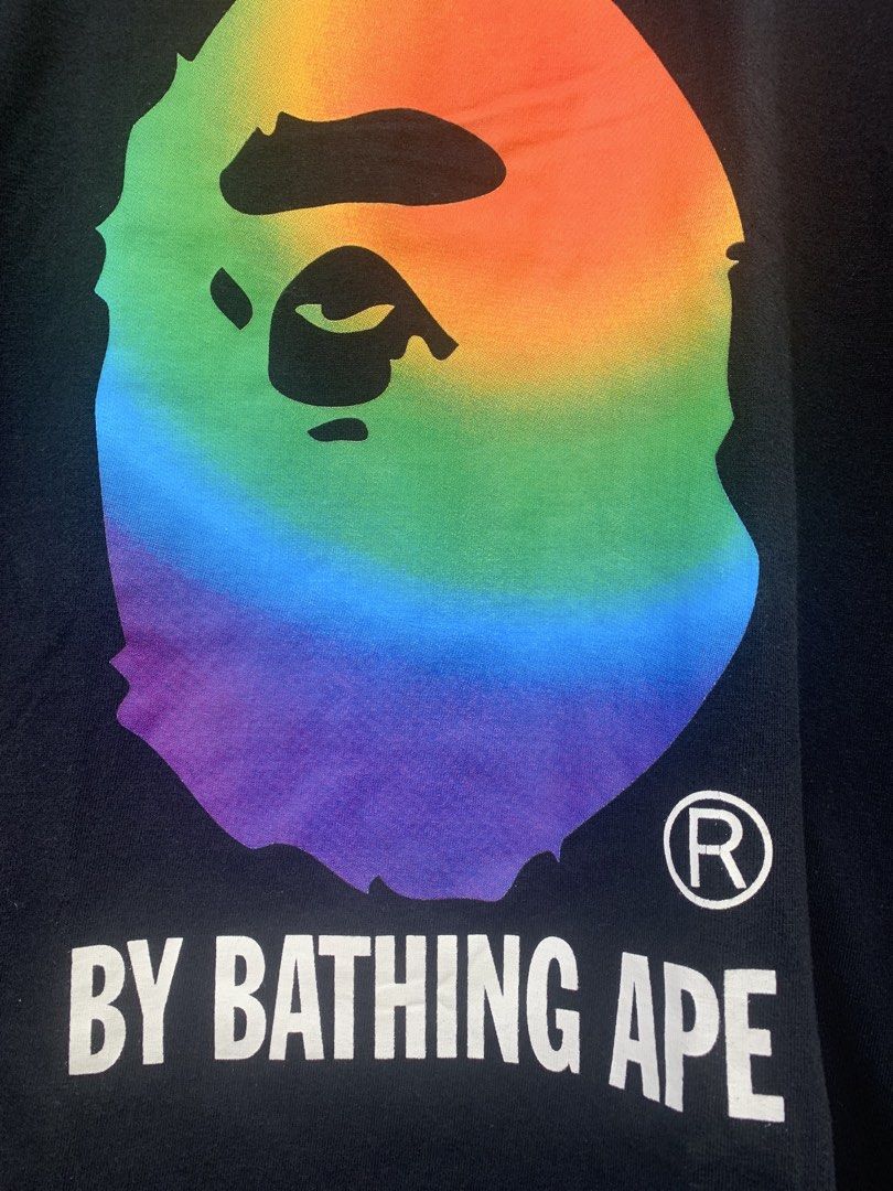 BAPE Rainbow Ape Head T-Shirt (Category: Tshirts & Polo Shirts ) located in Aloran. Submitted by chester78864 (Listing ID 1463904172, Image 2). Description: - Authentic BAPE T-shirt - Features the iconic rainbow ape head graphic - "BY BATHING APE" text detail - Size: Large (L) - Comes with original tags.