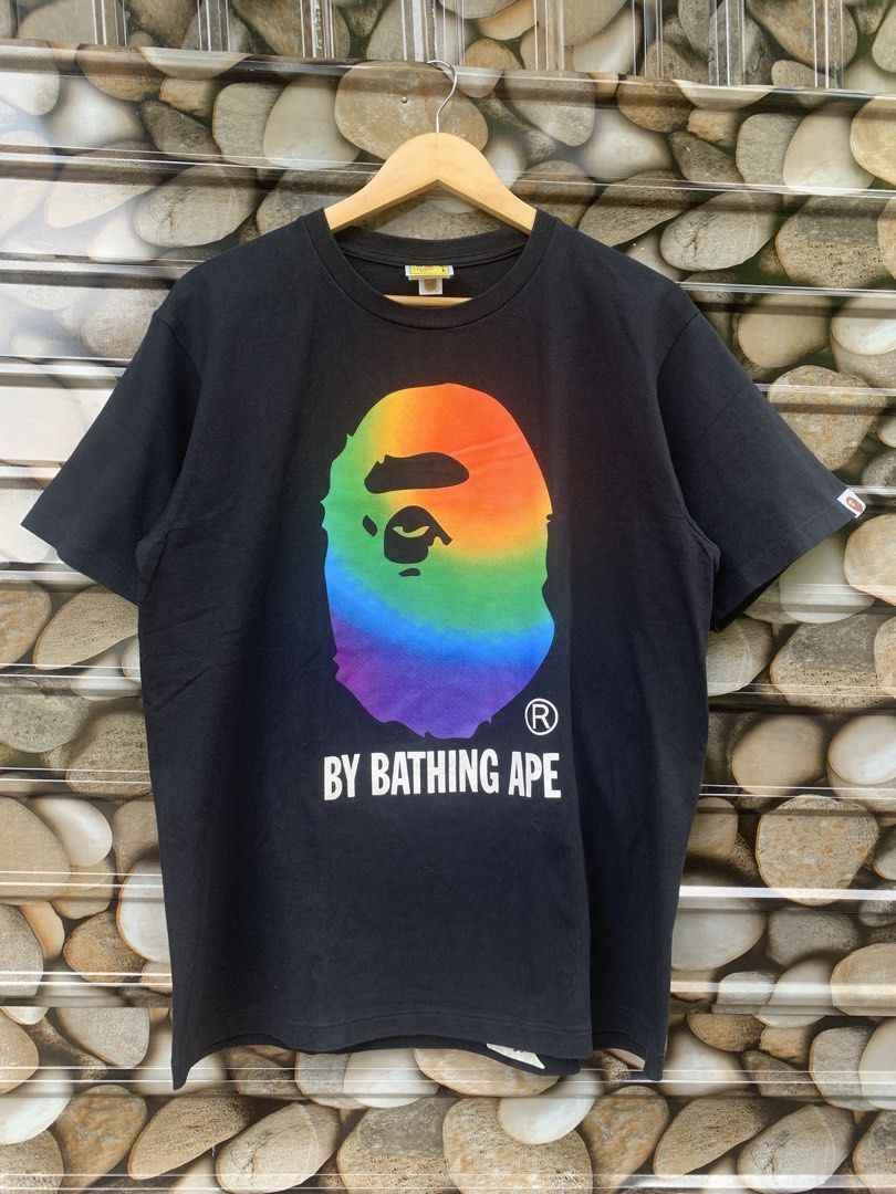 BAPE Rainbow Ape Head T-Shirt (Category: Tshirts & Polo Shirts ) located in Aloran. Submitted by chester78864 (Listing ID 1463904172, Image 1). Description: - Authentic BAPE T-shirt - Features the iconic rainbow ape head graphic - "BY BATHING APE" text detail - Size: Large (L) - Comes with original tags.