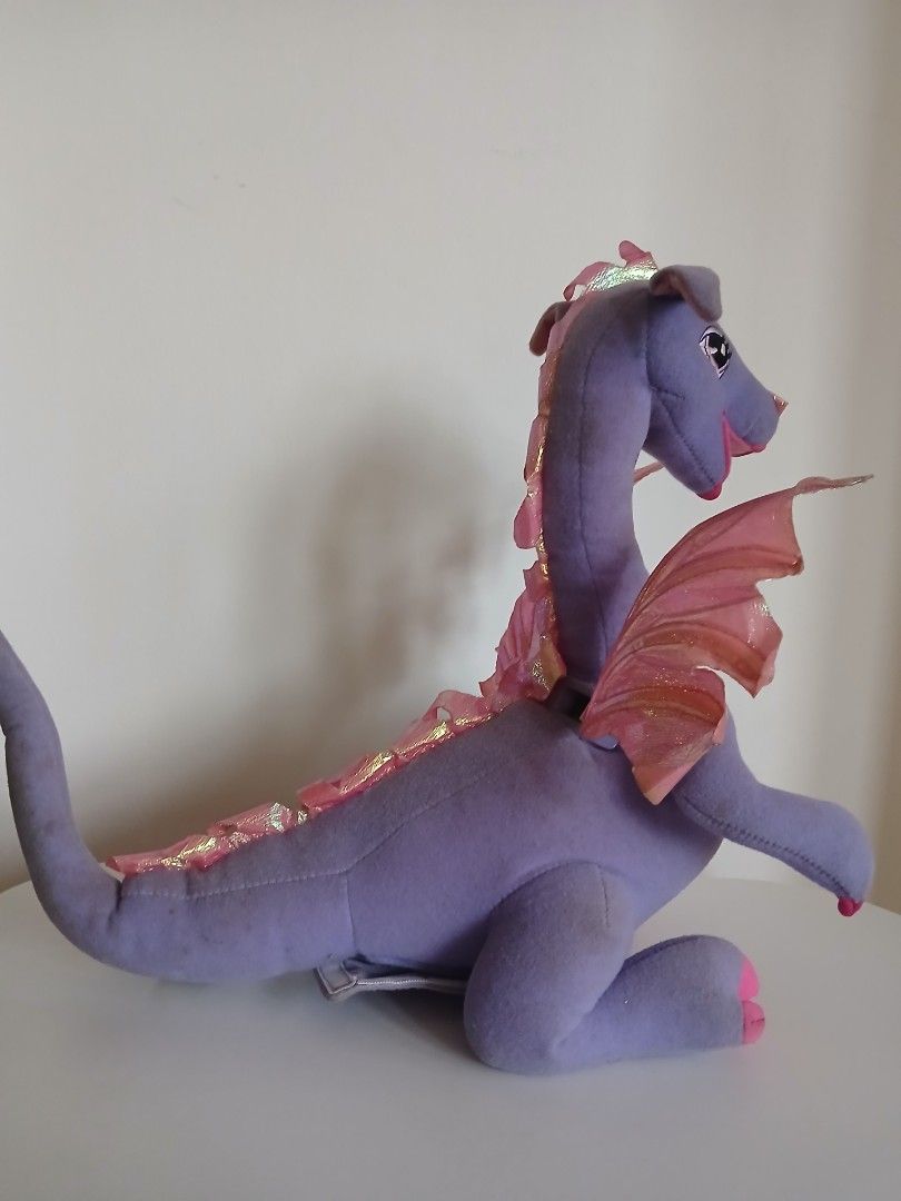 Barbie as Rapunzel 2002 Penelope Dragon (Category: Plushies & Soft Toys) located in Subic. Submitted by frncnjntmr22 (Listing ID 1463823018, Image 2). Description: - Adorable purple dragon plush toy - Features sparkly pink wings - Rainbow gradient on its belly - Super soft and huggable material - Ideal for playtime or as a cute decoration - A must-have for any dragon lover! "working" "ignore & pass sa barat at maaarte perpeksyunista lumayas.".
