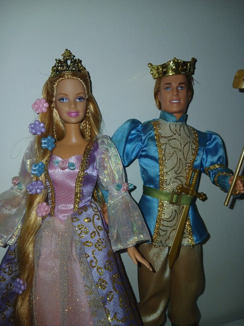 Barbie as Rapunzel & Prince Stefan set 2002 (Category: Kids Toys) located in Subic. Submitted by frncnjntmr22 (Listing ID 1463841013, Image 2). Description: - Princess doll with long blonde hair and flower accents - Prince doll in a blue and gold outfit - Accessories included: crown, sword, shield, and hairbrush - Encourages imaginative play - Perfect gift for Barbie enthusiasts *ken not working anymore retested already. "ignore& pass sa barat at