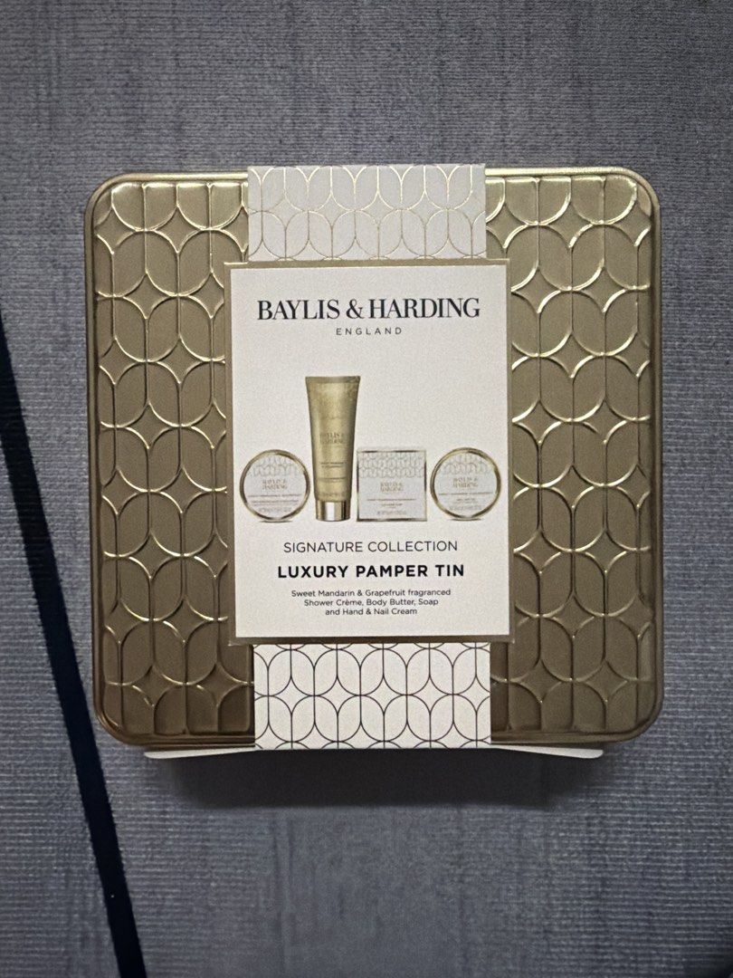 Baylis & Harding Luxury Pamper Tin Gift Set (Category: Body Care) located in Manila. Submitted by fayealvrz (Listing ID 1463769952, Image 1). Description: - Baylis & Harding Signature Collection Luxury Pamper Tin - Scent: Sweet Mandarin & Grapefruit - Includes: Shower Crème, Body Butter, Soap, Hand & Nail Cream - Packaging: Decorative gold tin.