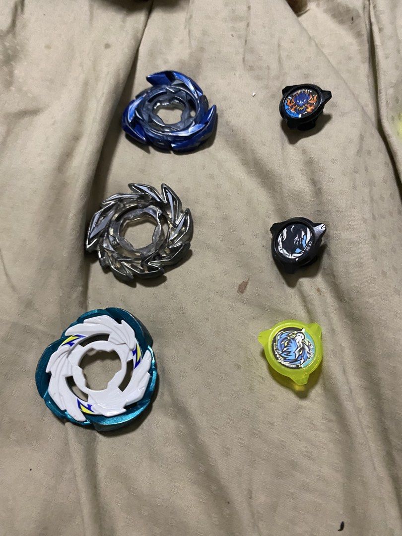 Beyblade x lot (Category: Action & Battle Toys) located in Manila. Submitted by silverbear_7419c2 (Listing ID 1463841884, Image 2). Description: Beyblade x lot take all CX LINE: Blades: Brave Brush Blast Chip: Dran Fox Pegasus Assist: Assault Jaggy Slash UX/BX saber samurai Silverwolf Leoncrest Impact drake Wizard arrow Bullet griffon RACHETS: 460 160 960 770 560 360 660 270 070 BITS Tr Yb Yb Gn Lr H L A Fb Fb V Dm is 🔑 .