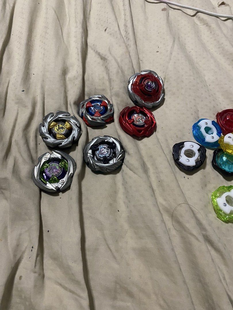 Beyblade x lot (Category: Action & Battle Toys) located in Manila. Submitted by silverbear_7419c2 (Listing ID 1463841884, Image 1). Description: Beyblade x lot take all CX LINE: Blades: Brave Brush Blast Chip: Dran Fox Pegasus Assist: Assault Jaggy Slash UX/BX saber samurai Silverwolf Leoncrest Impact drake Wizard arrow Bullet griffon RACHETS: 460 160 960 770 560 360 660 270 070 BITS Tr Yb Yb Gn Lr H L A Fb Fb V Dm is 🔑 .